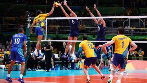 A group of men playing volleyball Description automatically generated with medium confidence